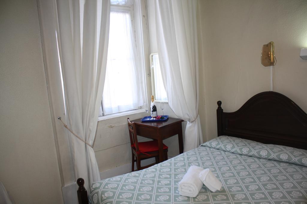 Pensao Residencial Estrela Do Mondego Hotell Lisboa Rom bilde