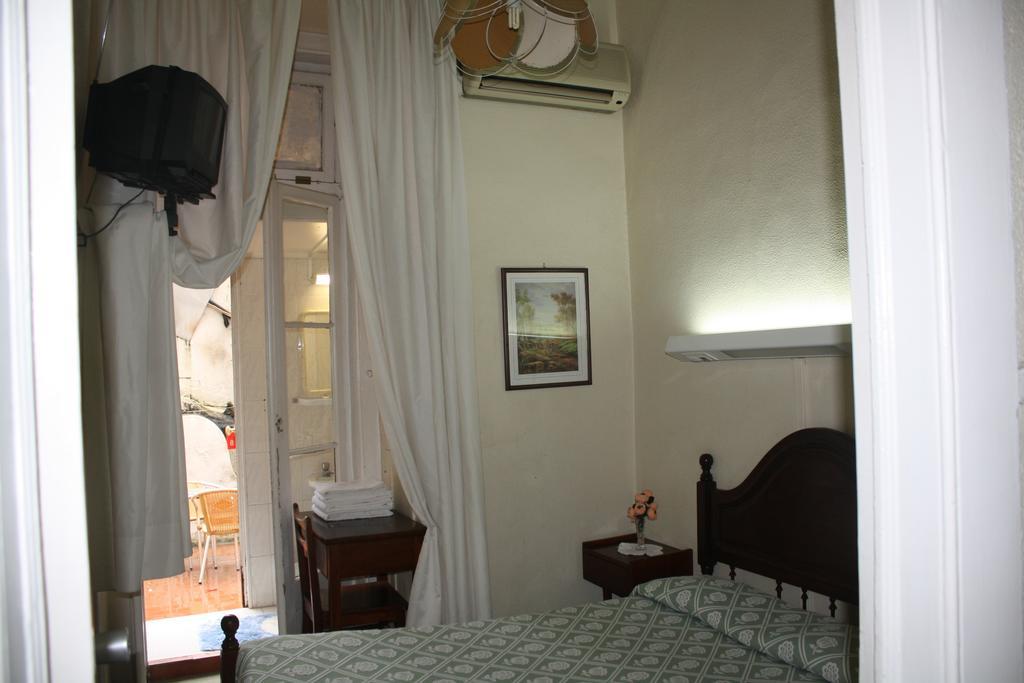 Pensao Residencial Estrela Do Mondego Hotell Lisboa Rom bilde